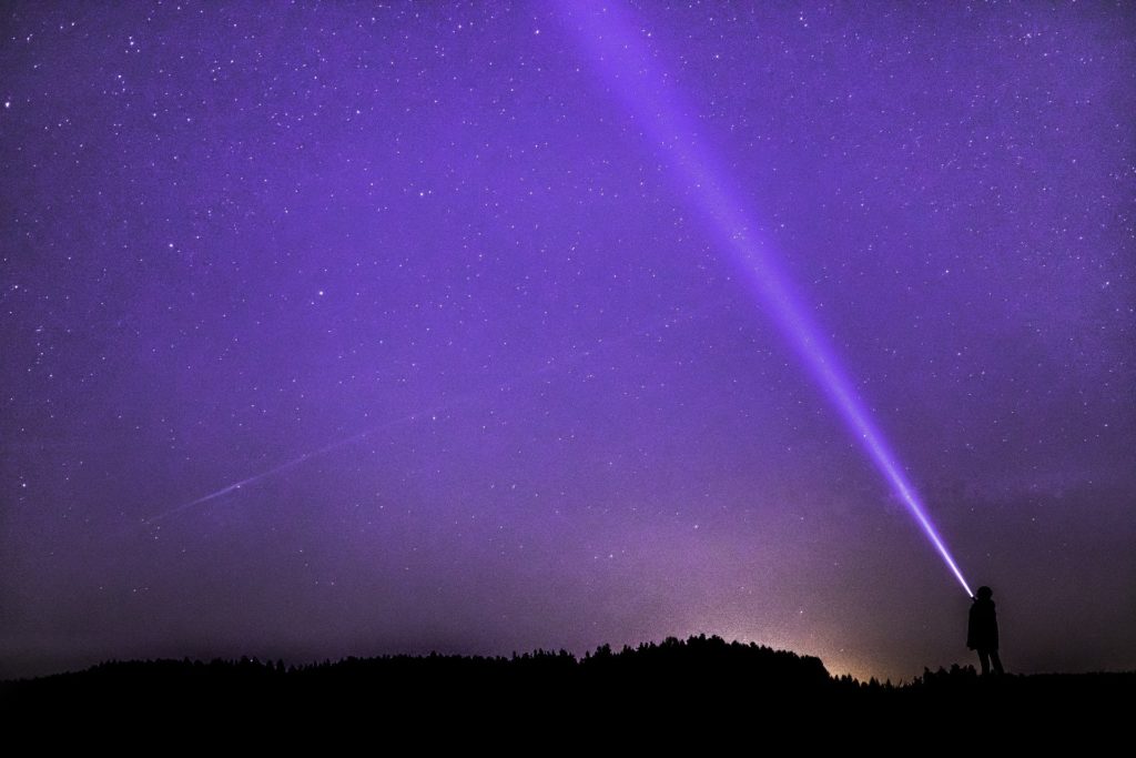Light shining in the darkness of a COVID19 night sky