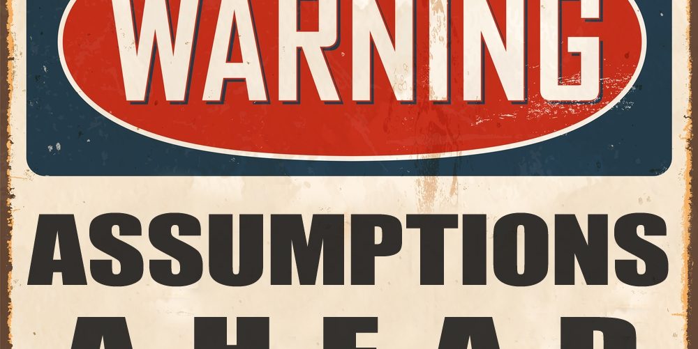 Warning sign - Assumptions Ahead