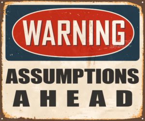 Warning sign - Assumptions Ahead